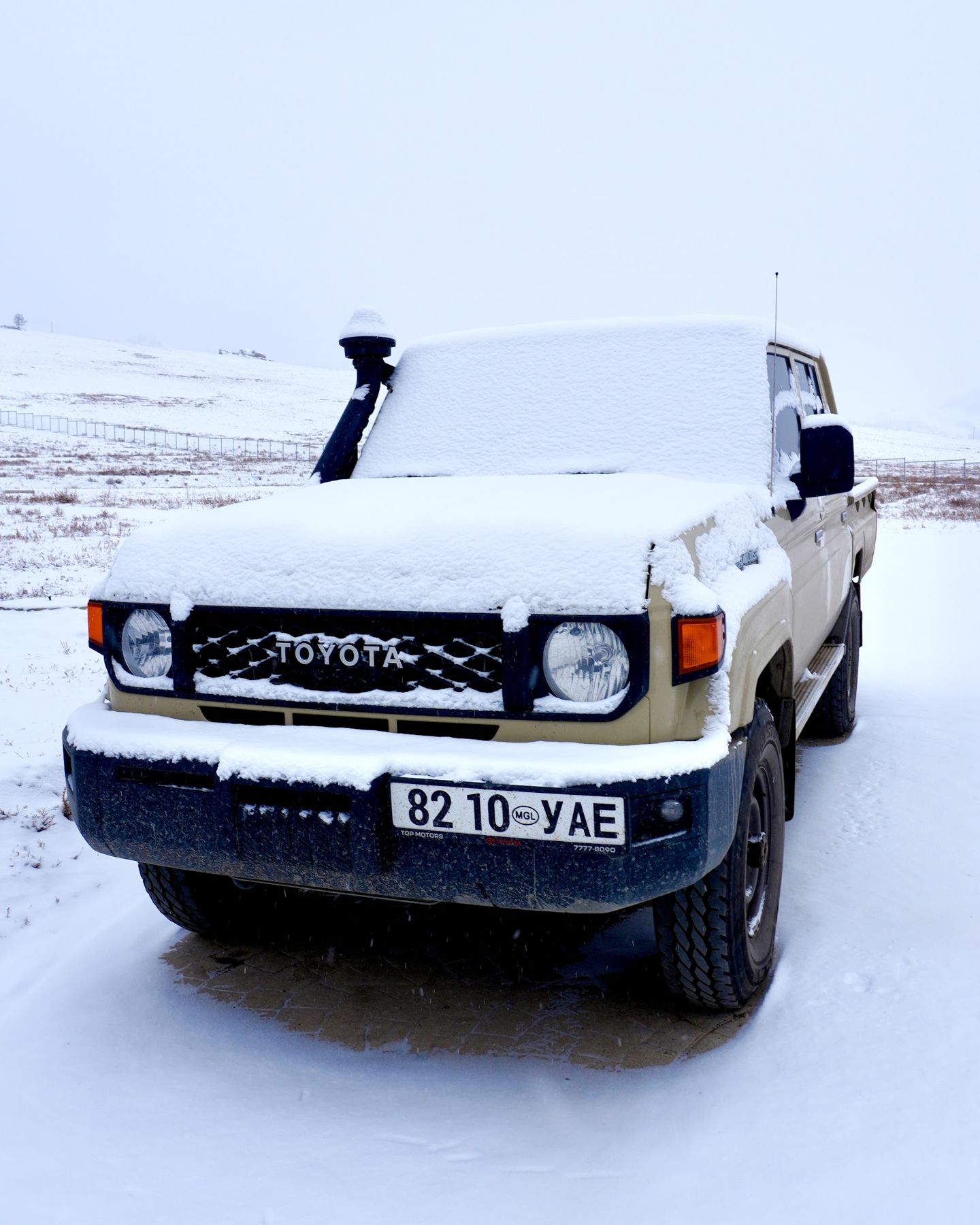 The lodge Land Cruiser in snow